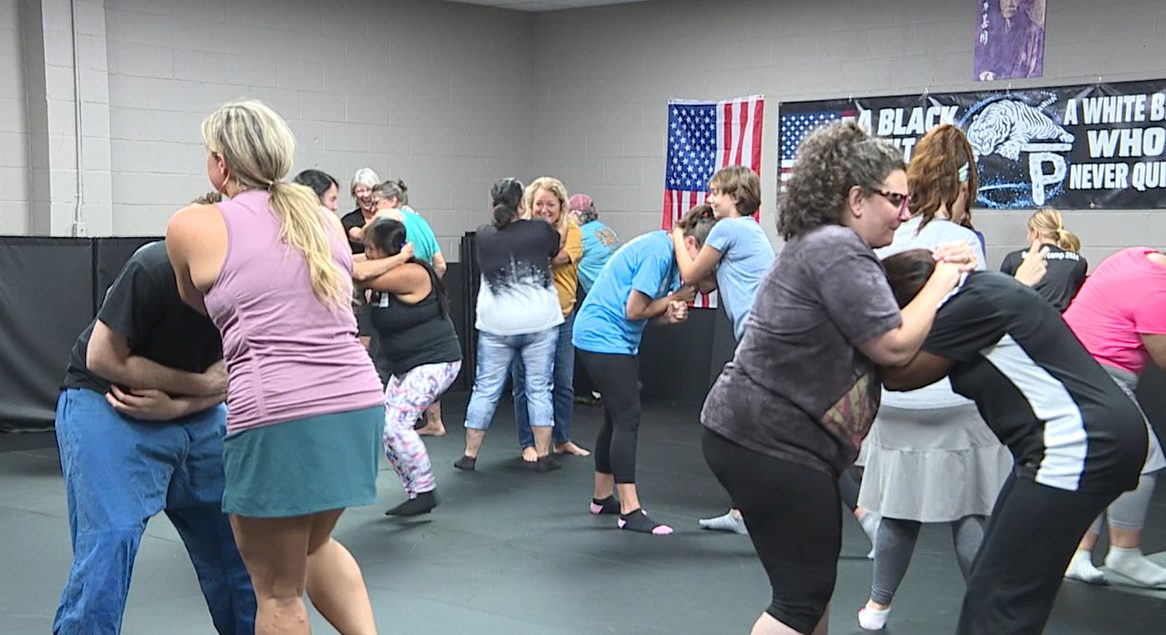 Participants practice self-defense together at Legacy Evolution Martial Arts in Jackson, Tennessee.