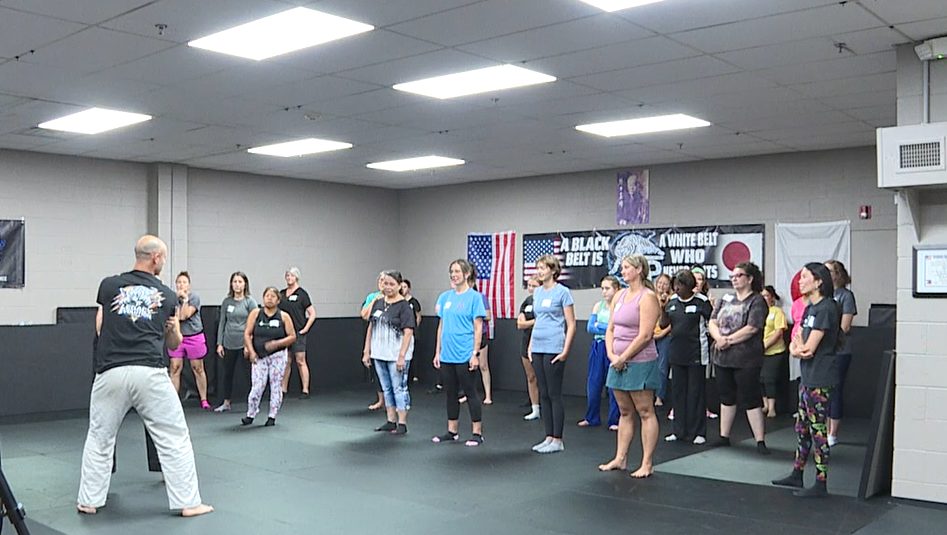 An instructor addresses participants at the free women’s self-defense class in Jackson.